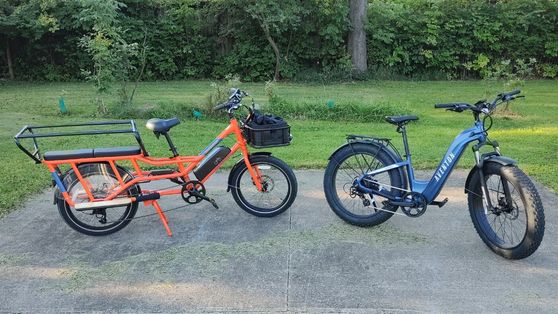 Orange Radwagon 4 and blue Aventon Aventure.2 e-bikes